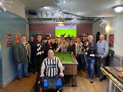 David Linford pictured front and centre in a pub in Radcliffe prior to an FA Trophy fixture in December 2021